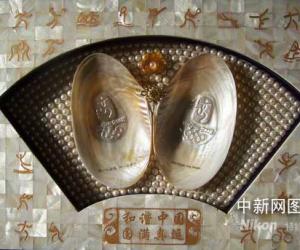浙江驚現奇特珍珠 天然長有北京奧運會徽(圖)